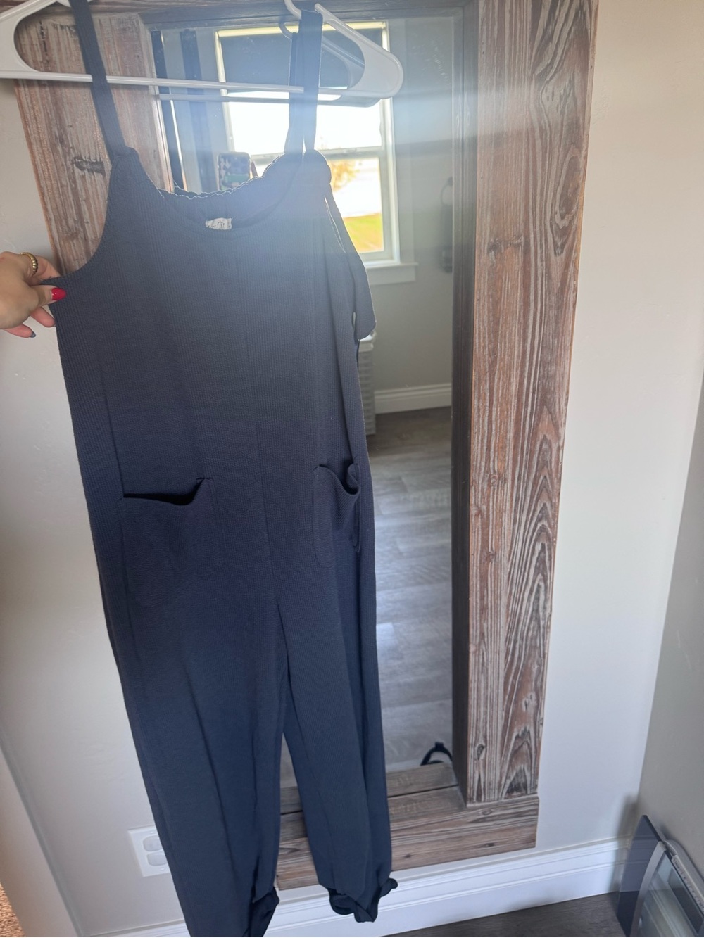 Sleeveless Dark Navy Jumpsuit with Front Pockets